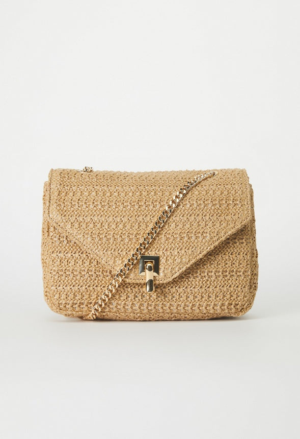 RAFFIA CROSSBODY WITH FLIP LOCK CLOSURE Natural